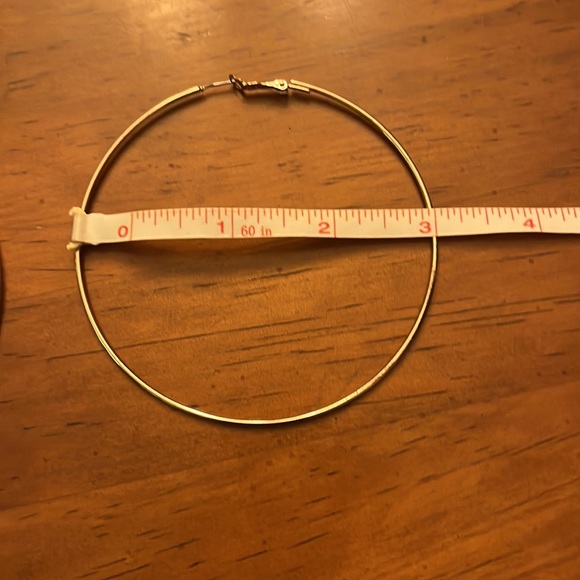 Rose gold color large hoop earrings. - Picture 2 of 2